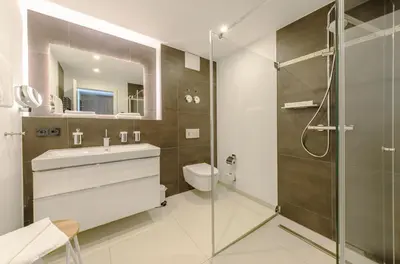 Ein Badezimmer in der Unterkunft Kleine Strandoase - Ferienwohnung mit Südbalkon, Wellness & Boddenblick