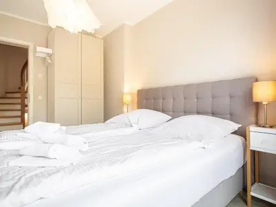 Ein Bett oder Betten in einem Zimmer der Unterkunft UNS VAGELHUS