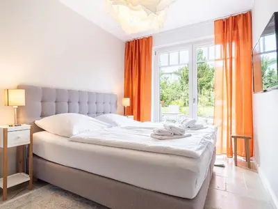 Ein Bett oder Betten in einem Zimmer der Unterkunft UNS VAGELHUS