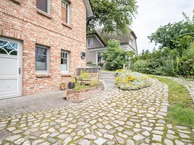 Ein Garten an der Unterkunft UNS MUUSLOCK