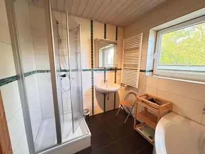 Ein Badezimmer in der Unterkunft Haus Anemone