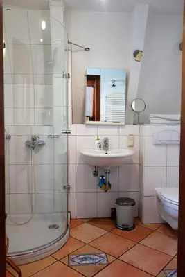 Ein Badezimmer in der Unterkunft Ferienhaus-Fischlandde Grünbaum Ahrenshoop