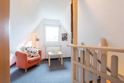 Ein Sitzbereich in der Unterkunft Ferienhaus Windrose