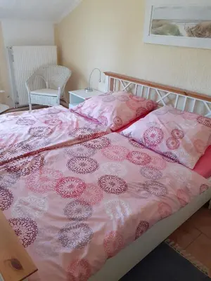 Ein Bett oder Betten in einem Zimmer der Unterkunft Ferienhaus 
