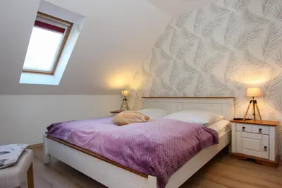 Ein Bett oder Betten in einem Zimmer der Unterkunft Anleger im Hafenhaus