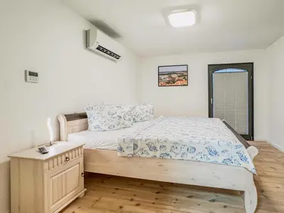 Ein Bett oder Betten in einem Zimmer der Unterkunft Speicherresidenz App 02 - Südseite