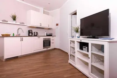 Küche/Küchenzeile in der Unterkunft Strandwohnung direkt am Meer - Whg 33