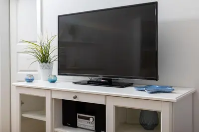TV/Unterhaltungsangebot in der Unterkunft Strandwohnung direkt am Meer - Whg 33