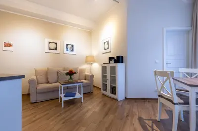 Ein Sitzbereich in der Unterkunft Strandwohnung direkt am Meer - Whg 32