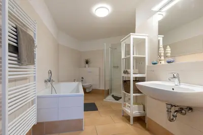 Ein Badezimmer in der Unterkunft Strandwohnung direkt am Meer - Whg 32