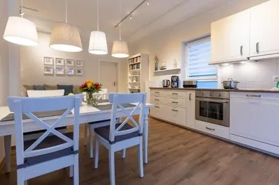 Küche/Küchenzeile in der Unterkunft Strandwohnung direkt am Meer - Whg 31