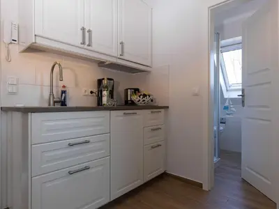 Küche/Küchenzeile in der Unterkunft Appartementhaus Zingst 1 - Urlaub zwischen Meer & Bodden