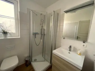 Ein Badezimmer in der Unterkunft Appartementhaus Zingst 2 - Urlaub zwischen Meer & Bodden