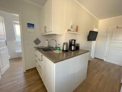 Küche/Küchenzeile in der Unterkunft Appartementhaus Zingst 3 - Urlaub zwischen Meer & Bodden