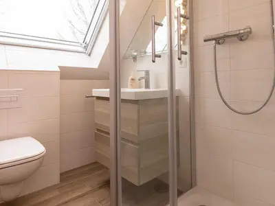 Ein Badezimmer in der Unterkunft Appartementhaus Zingst 3 - Urlaub zwischen Meer & Bodden