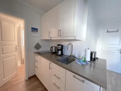 Küche/Küchenzeile in der Unterkunft Appartementhaus Zingst 4 - Urlaub zwischen Meer & Bodden