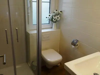 Ein Badezimmer in der Unterkunft Appartementhaus Zingst 4 - Urlaub zwischen Meer & Bodden