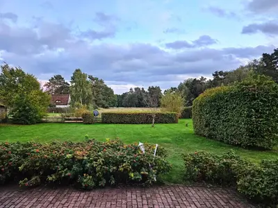 Ein Garten an der Unterkunft Dat smucke Huus