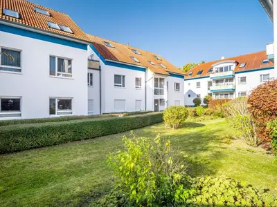 Ein Garten an der Unterkunft Residenz am Strand Wohnung 3-55