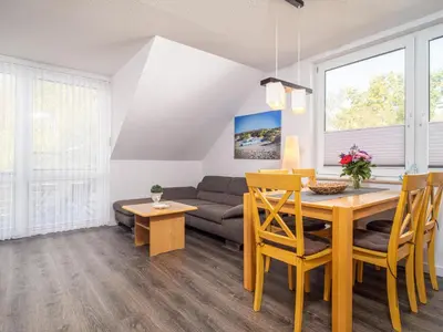 Ein Sitzbereich in der Unterkunft Residenz am Strand Wohnung 3-55