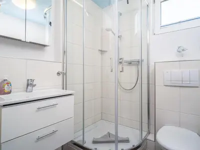 Ein Badezimmer in der Unterkunft Residenz am Strand Wohnung 3-55