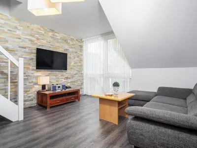 TV/Unterhaltungsangebot in der Unterkunft Residenz am Strand Wohnung 3-55