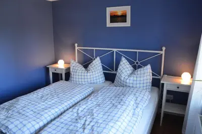 Ein Bett oder Betten in einem Zimmer der Unterkunft Ferienwohnung Gänsemarkt