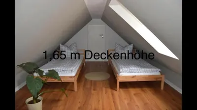 Ein Bett oder Betten in einem Zimmer der Unterkunft Ferienwohnung Gänsemarkt