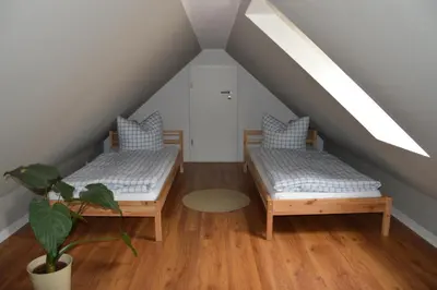Ein Bett oder Betten in einem Zimmer der Unterkunft Ferienwohnung Gänsemarkt