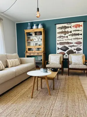 Ein Sitzbereich in der Unterkunft Ferienhaus Landleven
