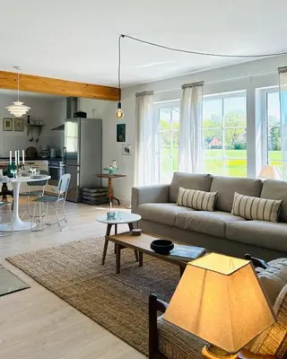 Ein Sitzbereich in der Unterkunft Ferienhaus Landleven