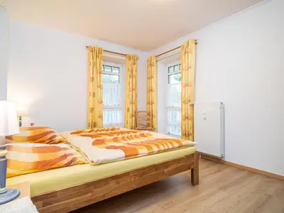 Ein Bett oder Betten in einem Zimmer der Unterkunft Villa Nicole - Wohnung 01
