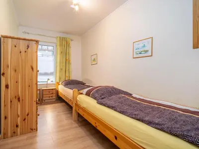 Ein Bett oder Betten in einem Zimmer der Unterkunft Villa Sonja - Wohnung 07