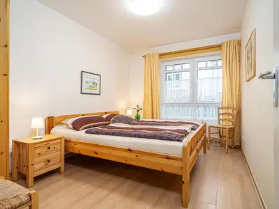 Ein Bett oder Betten in einem Zimmer der Unterkunft Villa Sonja - Wohnung 08