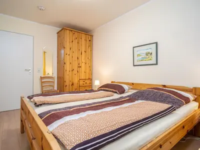 Ein Bett oder Betten in einem Zimmer der Unterkunft Villa Sonja - Wohnung 08