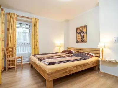 Ein Bett oder Betten in einem Zimmer der Unterkunft Villa Sonja - Wohnung 08