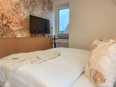 Ein Bett oder Betten in einem Zimmer der Unterkunft Kraanstiet 3