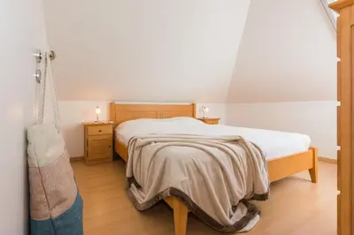 Ein Bett oder Betten in einem Zimmer der Unterkunft Likedeeler Weg 1 Whg 24 - b68655