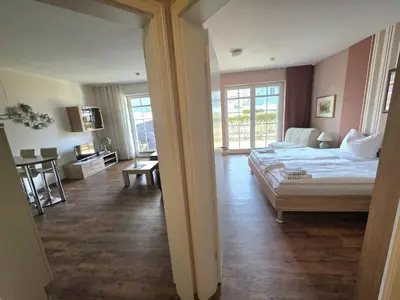 Ein Bett oder Betten in einem Zimmer der Unterkunft Strandvogel