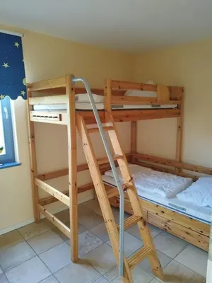 Ein Bett oder Betten in einem Zimmer der Unterkunft Utkiek 1