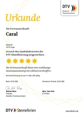 Ein Zertifikat, Auszeichnung, Logo oder anderes Dokument, das in der Unterkunft caraL - Die Familienferienwohnung in Zingst ausgestellt ist