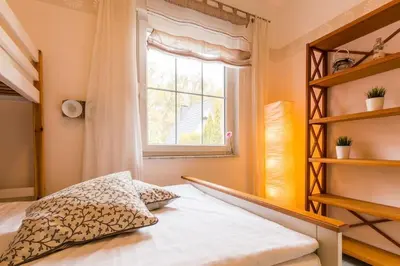 Ein Bett oder Betten in einem Zimmer der Unterkunft Seepferdchen