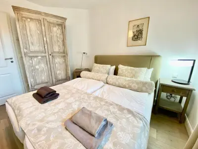 Ein Bett oder Betten in einem Zimmer der Unterkunft Ferienwohnung Dornrose 31