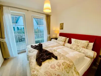 Ein Bett oder Betten in einem Zimmer der Unterkunft Ferienwohnung Dornrose 31