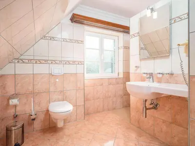 Ein Badezimmer in der Unterkunft Haus Brise