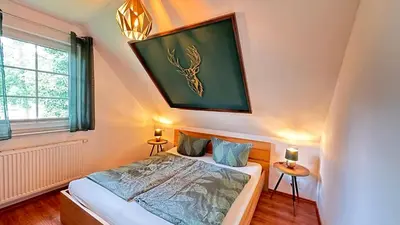 Ein Bett oder Betten in einem Zimmer der Unterkunft Waldgold