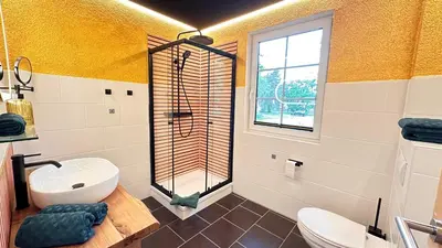 Ein Badezimmer in der Unterkunft Waldgold
