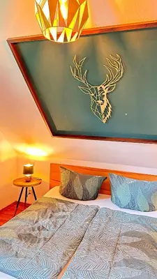 Ein Bett oder Betten in einem Zimmer der Unterkunft Waldgold