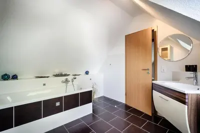 Ein Badezimmer in der Unterkunft Buhne 9