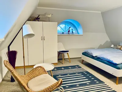 Ein Bett oder Betten in einem Zimmer der Unterkunft Achtern Diek 12b - Wohnung 5